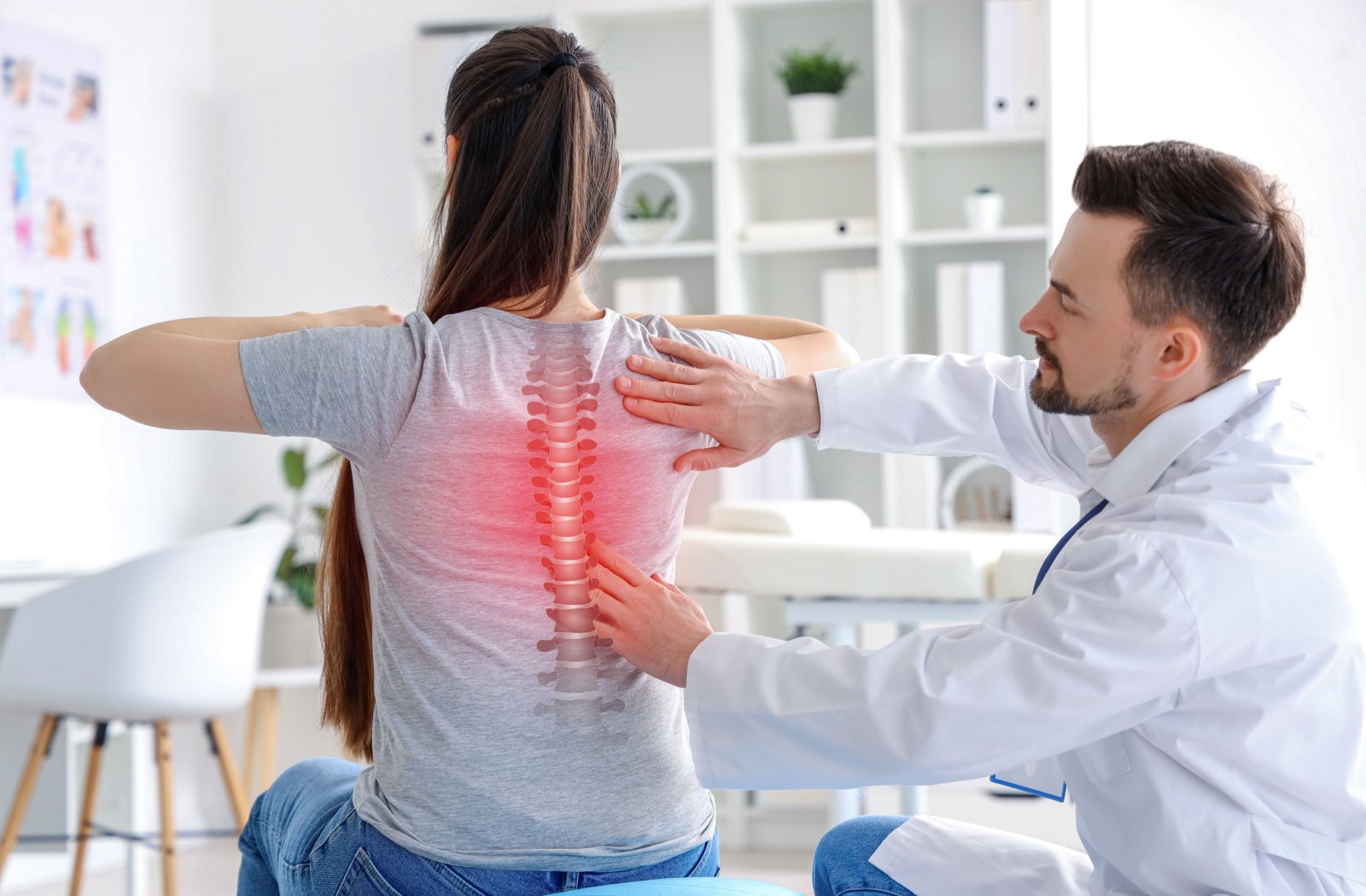 Chiropractor working with a patient to adjust spinal alignment and improve mobility.