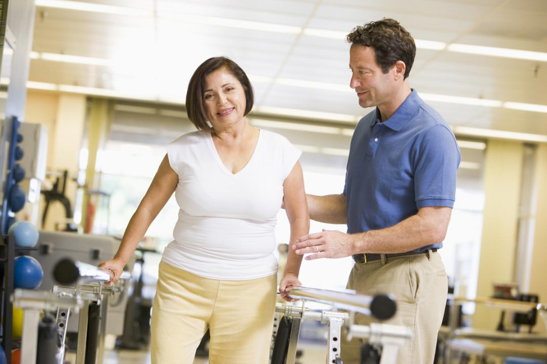 woman walking in post operation pain rehabilitation